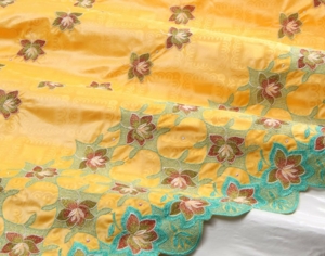 Bazin Brodé light orange - turquoise