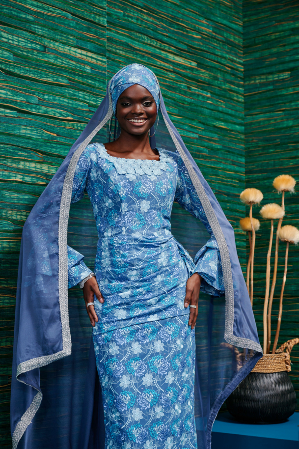 Embroidery in blue with traditional scarf