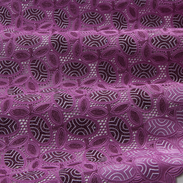 Broderie anglaise in lilac-purple